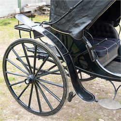 George IV Phaeton Carriage by Mills, Paddington, London

A George IV four wheeled phaeton carriage by Mills, Paddington, London, the hubs stamped accordingly, with black painted bodywork, folding black leather hood, upholstered passenger compartment and rear luggage platform. The carriage is fitted with wooden spoked wheels, yellow coachlining, leaf spring suspension, front mudguards, metal footrests and shafts for single horse use. In original condition by one of the best carriage builders of the day

Features

• Maker’s hubs marked Mills, Paddington, London
• Four wheeled phaeton carriage
• Black painted bodywork with fine yellow coachlining
• Folding black leather hood
• Button upholstered passenger seating
• Rear luggage platform with rail
• Wooden spoked wheels with rubber tyres
• Leaf spring suspension
• Shafts for single horse use
• Front mudguards and metal footrests
• Fitted with a side mounted ratchet hand brake operating on the rear wheel


Dimensions:
Overall length: 305 cm
Width: 160 cm
Height: 213 cm

Wheel Diameters:
Front wheels: 77 cm
Rear wheels: 107 cm

Seating:
Driving seats: 1
Passenger seats: 2