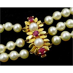 Three strand cultured pearl choker necklace, with 9ct gold ruby and pearl clasp and a five strand pearl necklace, with 14ct gold bead spacers and clasp, both in Mikimoto box