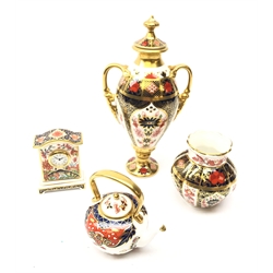  Royal Crown Derby Imari ceramics comprising urn shaped vase and cover no. 1128 H21cm, Haiku pattern miniature mantel clock, miniature kettle and vase no. 1128 (4)  