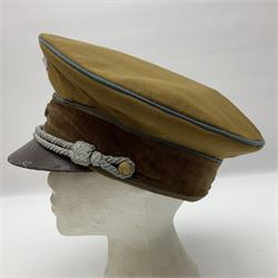 WW2 German Political Leaders brown cloth visor cap with metal insignia; labelled K. Hartel Weiden