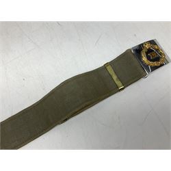 British Army Officers Sam Browne leather belt with shoulder strap; and webbing belt with Potter London Staybrite buckle for 19th Regiment of Foot (Green Howards) with various markings (2)