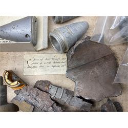 Small collection of WW2 shrapnel and German and British shell parts, most with manuscript details of where and when found including London, Leeds, Bristol, Linton-on-Ouse etc