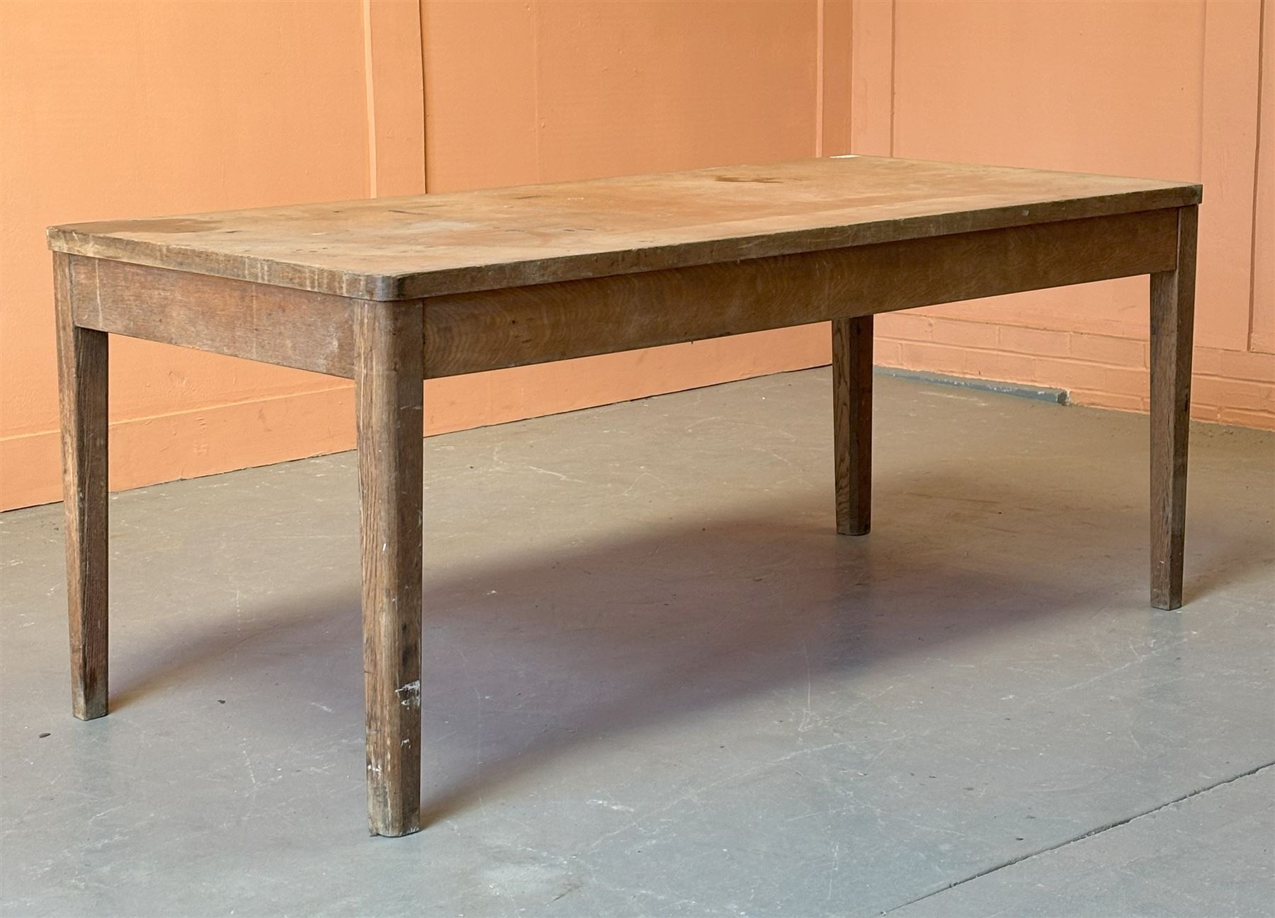 Early 20th century oak dining table, the rectangular top inset with compressed fibre panel, raised on tapered supports. H77cm, 183cm x 85cm. - COLLECTION BY APPOINTMENT FROM: The White House, Thirsk Road, Easingwold, York, YO61 3NF - CALL 01723 507111 TO ARRANGE