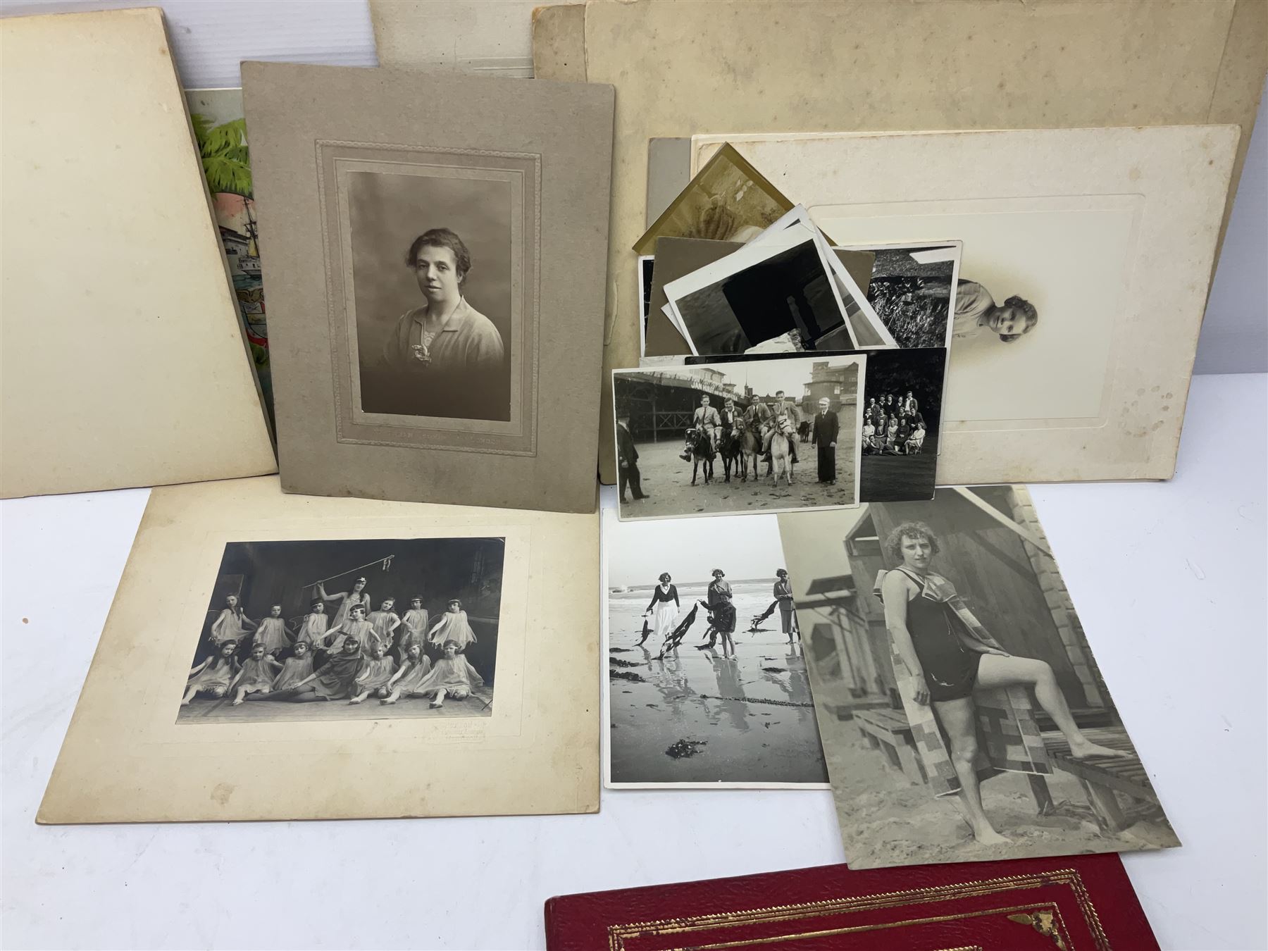 Two albums of cigarette cards, including Carreras Alice in Wonderland examples, together with vintage greetings cards, postcards, theatre stills, etc