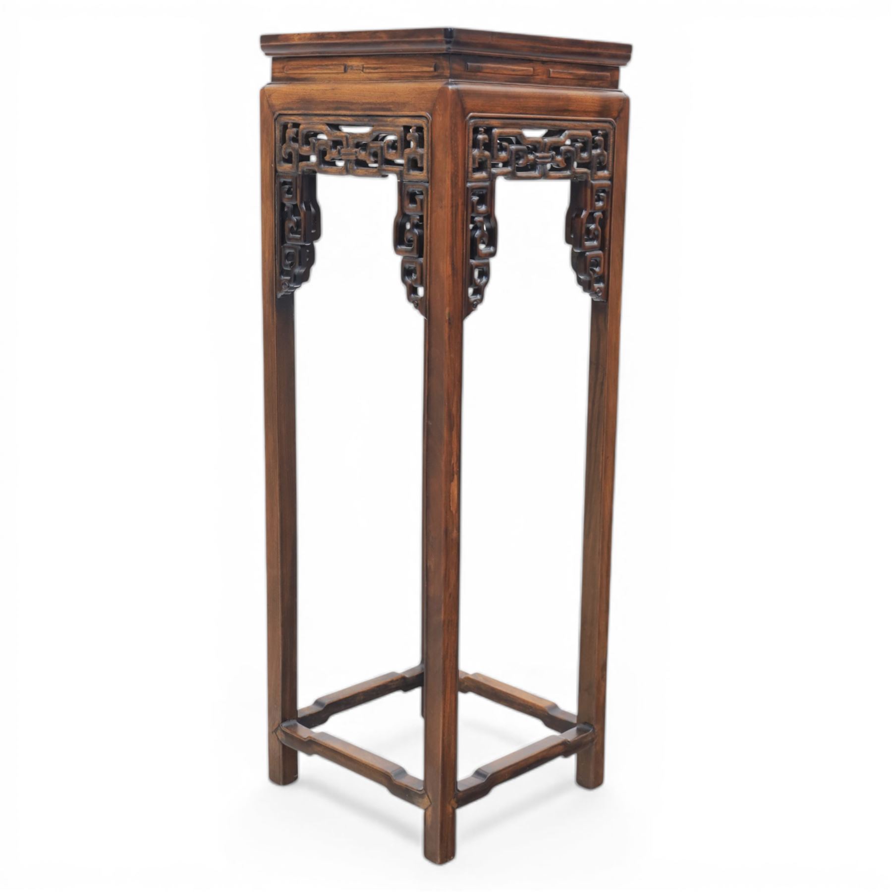 Chinese style hardwood open latticework plantstand, square top ove latticework spandrels raised on square supports united by stretchers