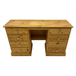 Solid pine twin pedestal desk, fitted with eight drawers