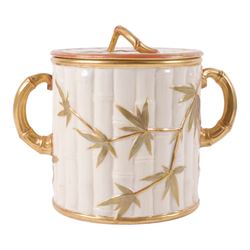 Royal Worcester Blush Ivory twin handled biscuit barrel and lid, in the form of bamboo with gilt highlights, H19cm 