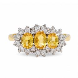 18ct gold yellow sapphire and diamond cluster ring, three oval cut sapphires, surrounded b...