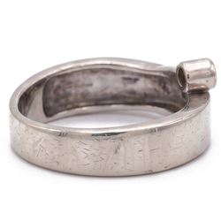 14ct white gold four stone diamond crossover ring, rubover and bezel set with four round cut diamonds, stamped 585