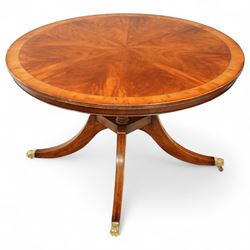 Regency design circular mahogany centre table, the radiating veneered top with contrasting...