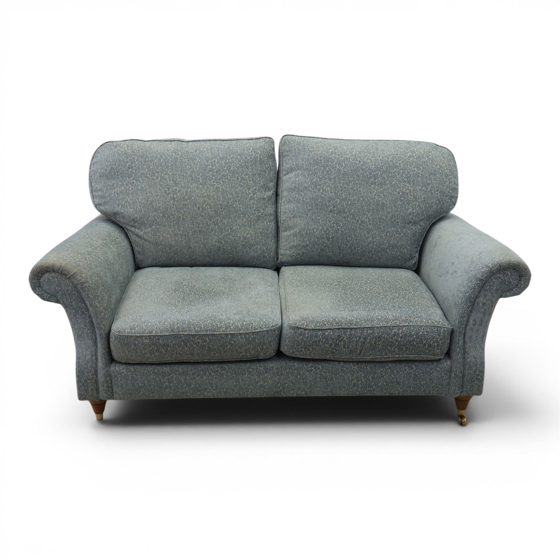 Marks & Spencer - 'Salisbury' two seater sofa, upholstered in blue fabric, scrolled arms and loose cushions