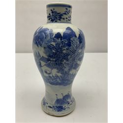 19th century Chinese Kangxi style blue and white jar and cover, decorated with figural and landscape scenes, the domed cover with foo dog finial, with four character marks beneath, H22cm