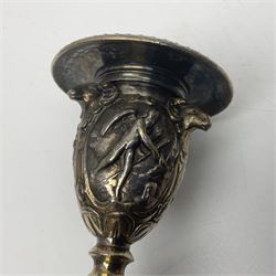 Pair of Victorian Elkington Mason & Co silver plated candlesticks, decorated in relief with ram masks and figures, H14cm