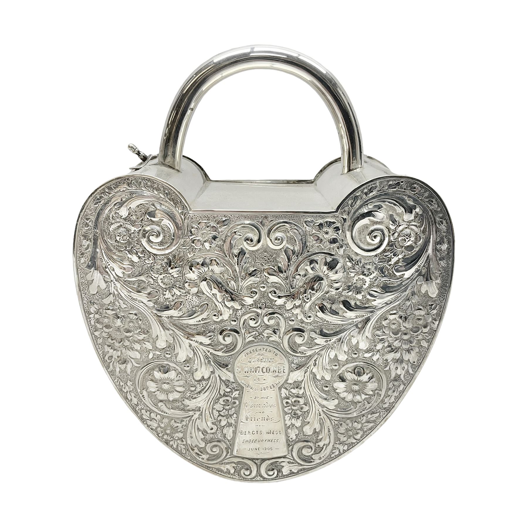 Silver plated, tea caddy, in the form of a heart, with repousse decoration, presented to H Whitcombe, H20cm