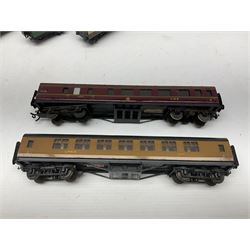 Exley '00' gauge - fourteen various coaches comprising four LMS maroon (3322 3rd, 2202 3rd, 6665 3rd and 388 Sleeping Car 3rd), LNER green/cream Buffet Car 21419, LNER teak 8639 1st, Southern green 6688 3rd, GWR brown/cream 3322 3rd, LNER 206 3rd, LNER 319 1st/3rd, SR green 351 3rd, SR green 188 Parcel Van, GWR 331 3rd and GWR 362 3rd; all unboxed (14)