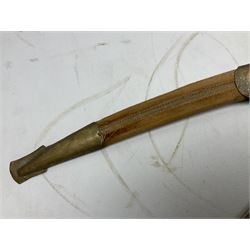 Early 20th century Indian ebonised sword stick, the 59.5cm blade with punched decoration and horn grip L94cm overall; and a reproduction Indian tulwar with scabbard (2)