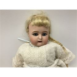 Simon & Halbig for Kammer & Reinhardt bisque head doll with applied hair, pierced ears, sleeping eyes, open mouth with teeth and tongue and composition body with jointed limbs, marked 'Halbig K (& in star) R' H35cm