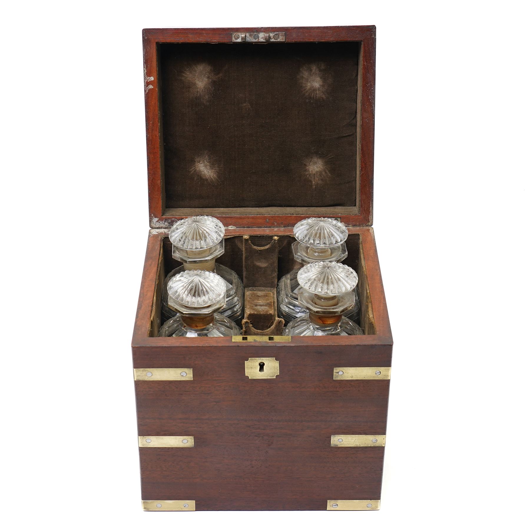 Victorian mahogany brass bound campaign style decanter box, with twin brass countersunk handles, containing four decanters, H23cm 