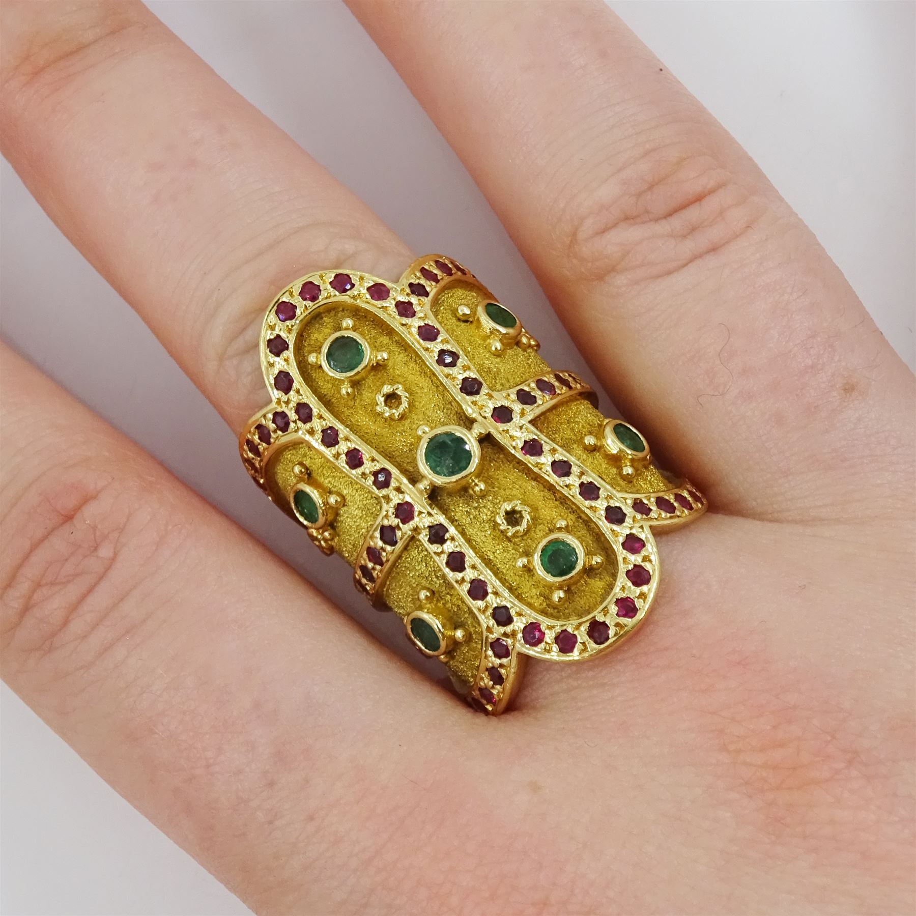 18ct gold emerald and ruby panel ring, stamped 750