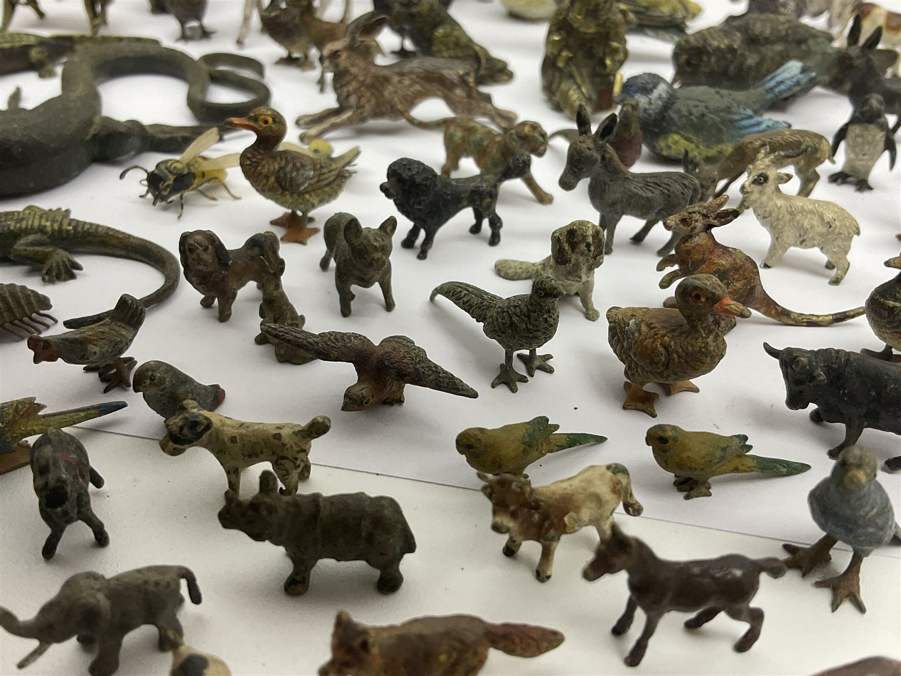 Collection of miniature cold painted bronze and similar animals, to include birds, sheep, horses etc 