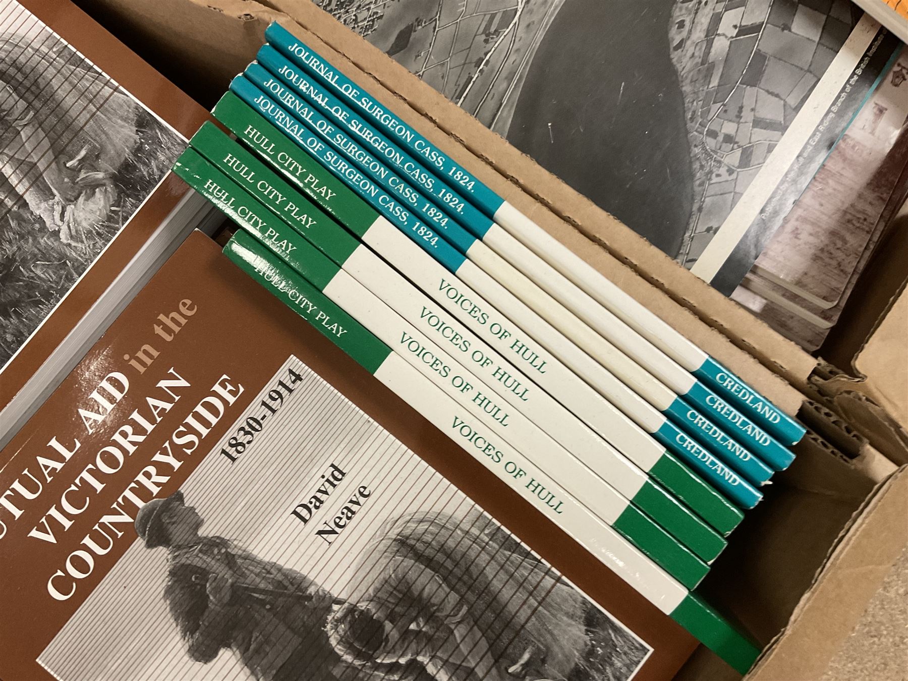 Books - Thirty seven copies of Mutual Air in the Victorian Countryside 1830-1914 by David Neave, four copies of Voices of Hull Real-Life Stories from the Hull City Play edited by Trevelyan Wright, four copies of The Journal of Surgeon Cass Aboard the Whaler 'Brunswick' of Hull, 1824 edited by A G Credland, four copies of This Righteous War by B S Barnes, four copies of Flying Sail Humber Keels and Sloops by Michael E Ulyatt, four copies of Old Beverley by Philip Brown, etc., in two boxes 