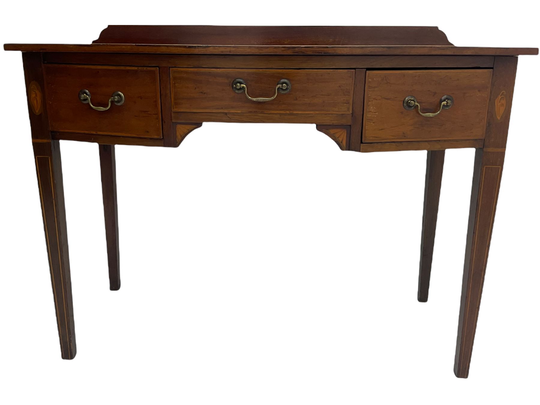 Edwardian mahogany dressing side table, raised back on bow front top with satinwood band, fitted with three drawers, inlaid with shell and fan motifs, square tapering supports