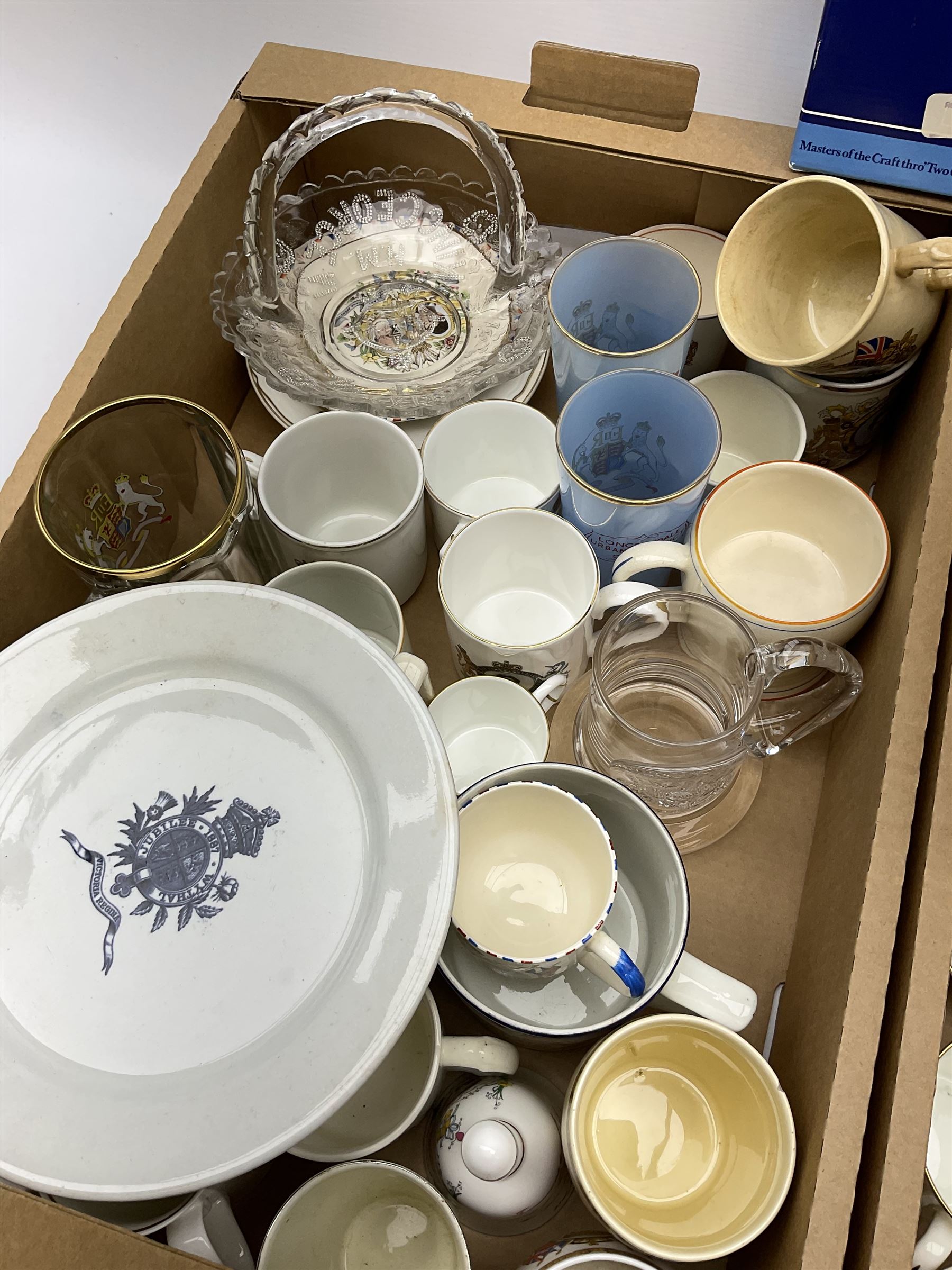 A large collection of commemorative ware, including Wedgewood Jasperware plates and trinket box for Royal silver jubilee, Shelley teacup and saucer for Edward VIII coronation, Bisto cups and saucers for George V and Queen Mary's coronation in 1911, loving cup, 1937 Coronation basket, thimbles, magazines and new cuttings etc. 