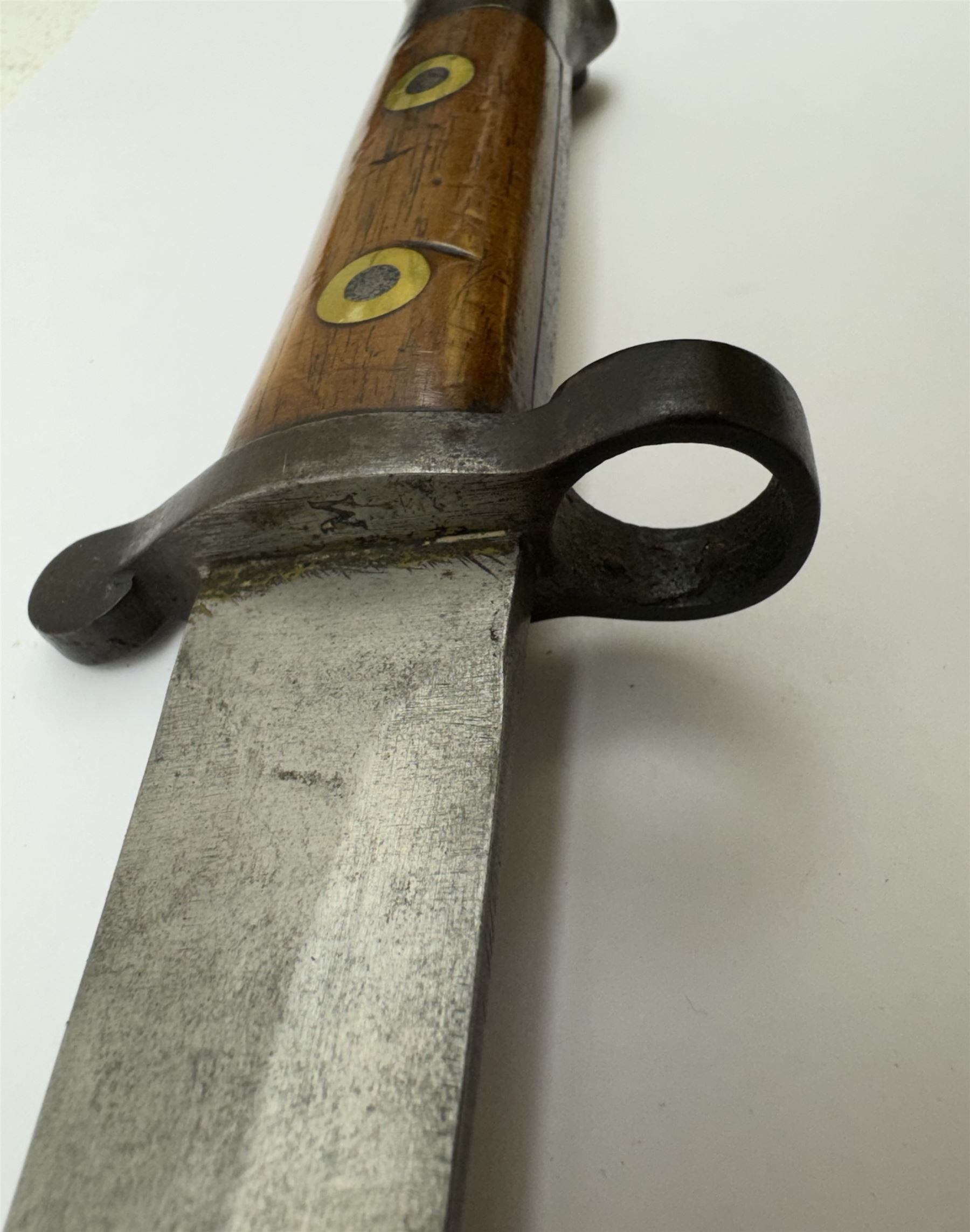 WWII Lee Metford rifle bayonet with original scabbard marked 586, with canvas frog, L44cm overall 
Notes; due to the condition of the bayonet it is possible this was issued to the home guard