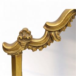 Late 20th century giltwood and composition over mantel mirror, with shaped and scrolled cresting centred by a shell cartouche, with foliate moulded shoulders and lower rail framing a rectangular plate