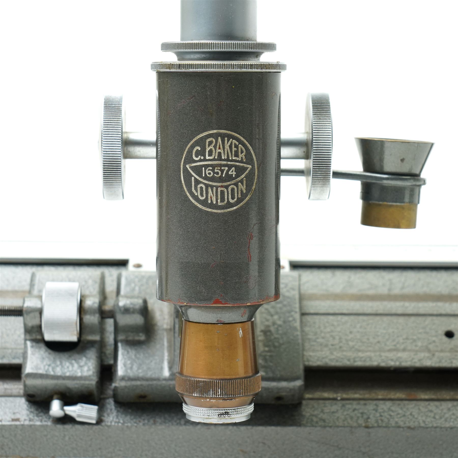  Baker of London travelling microscope with Chesterman vernier scale No16574 and a Swift brass microscope 