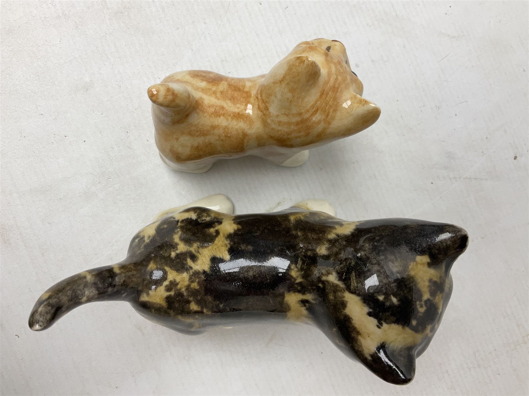 Two Winstanley figures of kittens, comprising tabby cat no 2 and ginger cat no 1, both with inset eyes and painted marks beneath, tallest H11cm