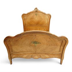 Mid-20th century French walnut small double 4' 2'' bedstead, shaped and moulded headboard with shell and curl acanthus leaf carved pediment with extending flower heads, quarter-matched veneers decorated with applied mouldings and cast gilt metal ribbon tie 