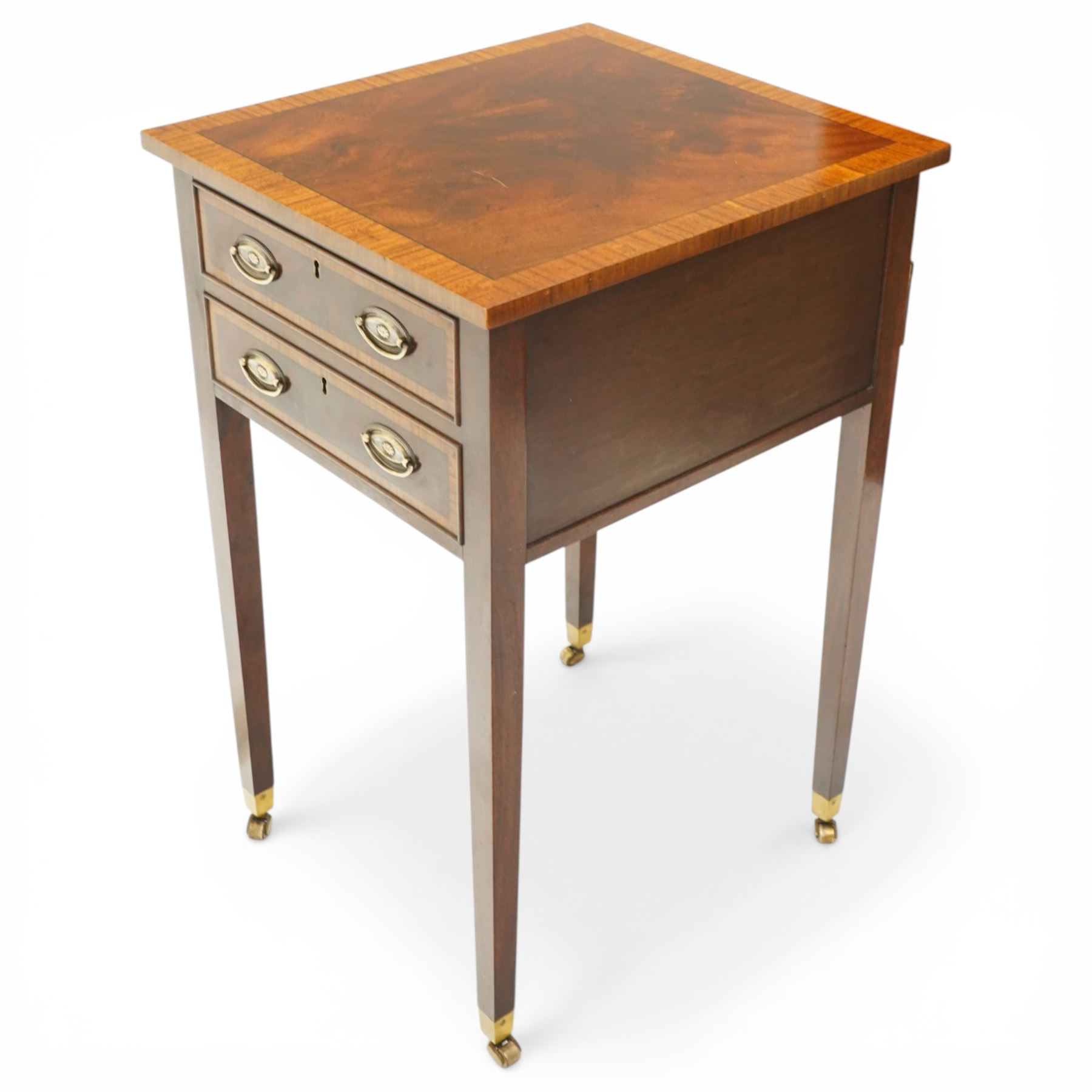 Georgian design inlaid mahogany collectors table, rectangular cross-banded top, fitted with two cock-beaded display drawers with interior glazed tops, with opposing faux drawers, fitted with pressed brass handle plates, on square tapering supports with castors, with keys