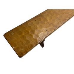 Gnomeman - adzed oak narrow bench, rectangular seat on shaped end supports united by pegged stretcher, carved with gnome signature, by Thomas Whittaker, Little Beck 