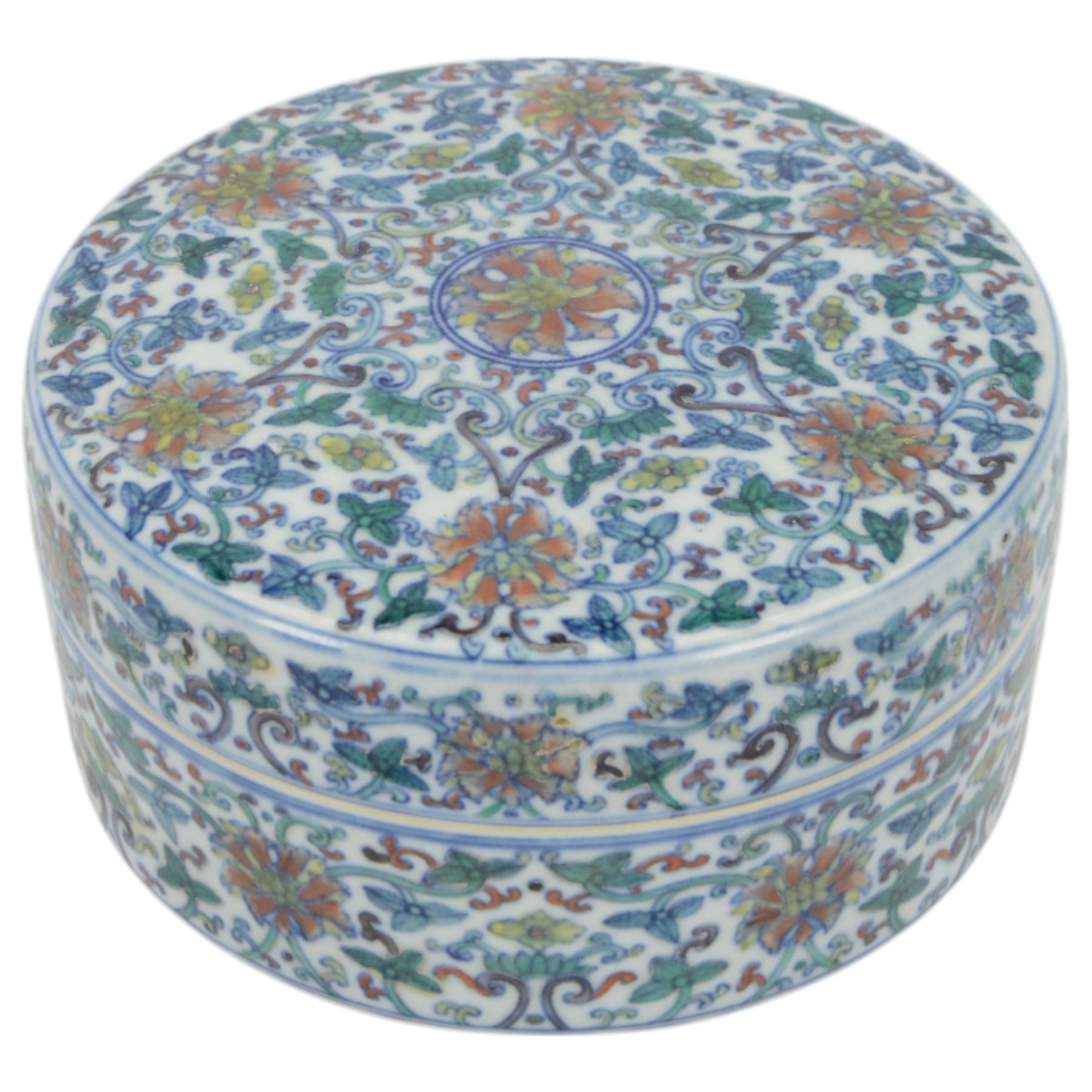 20th century Chinese Doucai box, of circular form, decorated in polychrome enamels with flowers and foliage, with character marks beneath, D18cm, H9cm
