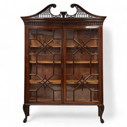 Large George III mahogany bookcase display cabinet, pierced swan neck pediment with floral...