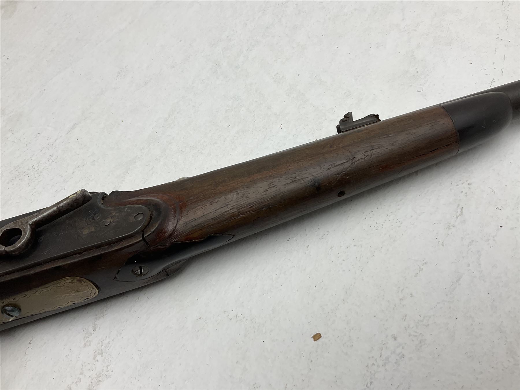 Late 18th century 7.2mm (approx. .28 calibre) Girandoni system single shot reservoir air rifle, the 62cm steel barrel with swivelling two-leaf rear sight, brass breech decorated with a sunburst and lever opening top loading, engraved steel lock-plates marked 'S. Gaskell' to the right side underneath the cocking lever, brass trigger guard,  leather covered steel butt reservoir of tapering conical form with brass ferrule and walnut fore-stock with horn mounts L107cm overall