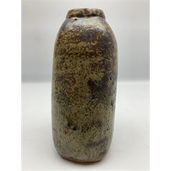 Janet Leach (American, 1918-1997) for Leach Pottery; studio pottery Bizen style vase of tapering form, the stoneware body decorated in a mottled green and brown dripped ash glaze, with impressed J.L. monogram and stamp marks beneath, H30cm