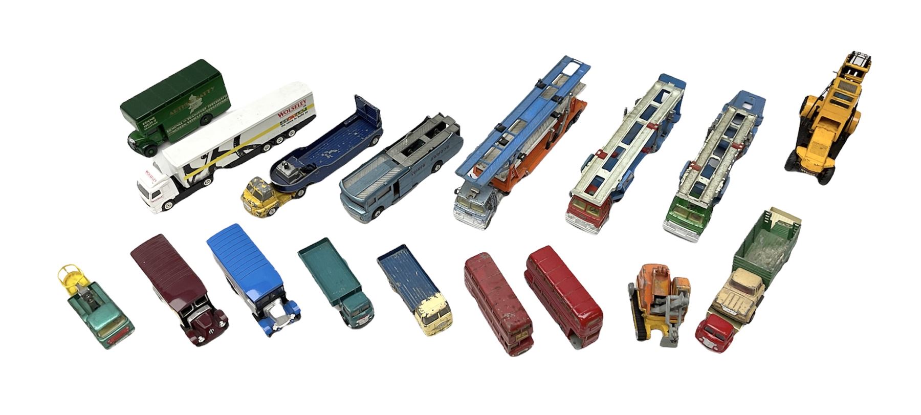 Corgi - eighteen unboxed and playworn/repainted die-cast commercial vehicles including Commer 5-Ton Wagon with drop-side trailer and two other 5-Ton wagons, Dodge Key Fargo, Jeep FC-150, two London Routemaster buses, Carrimore Trideck Transporter, two Carrimore Mark IV Transporters, Carrimore Low Loader, Ecurie Ecosse Racing Car Transporter etc (18)