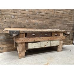 Large vintage work bench, fitted with six drawers and two vice