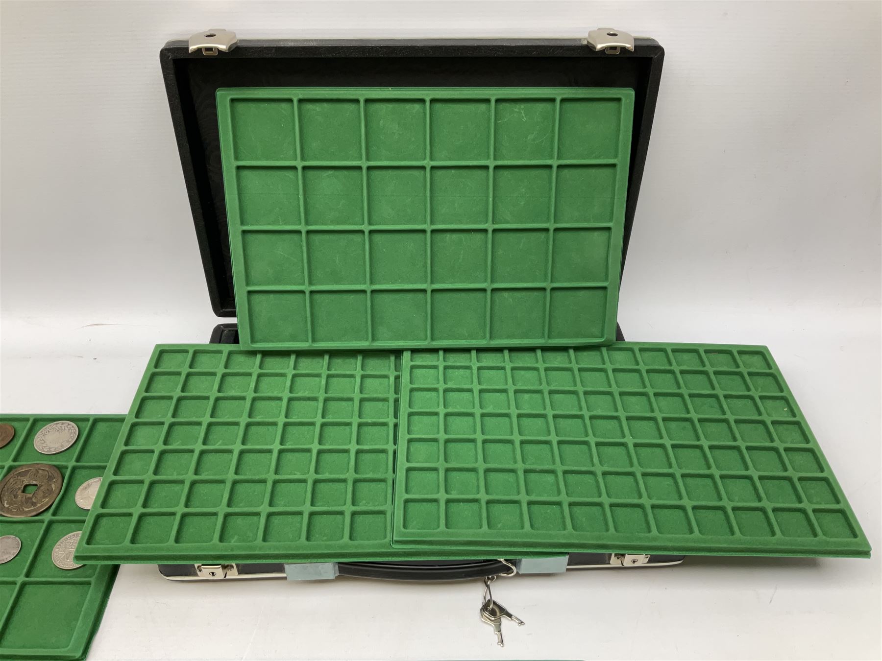 Coins and medallions including, York 1811 one shilling cattle and barber silver token, United States of America 1883O silver Morgan dollar, birds of destiny medal by Malcolm Appleby, Great British King George V 1930 halfcrown, King Edward VII 1902 silver medal, King George V 1916 halfcrown etc, housed in a case with lift out green coin trays