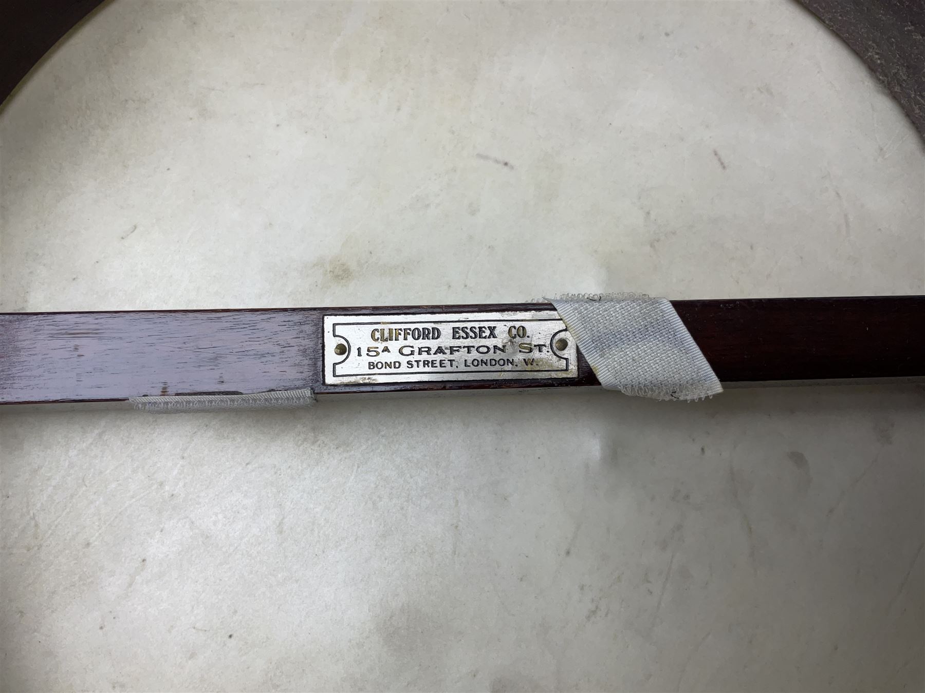 Five-string banjo by Clifford Essex Co. 15A Grafton Street, Bond Street, London W, with mother-of-pearl inlaid ebony fingerboard L92cm; in carrying case with strap