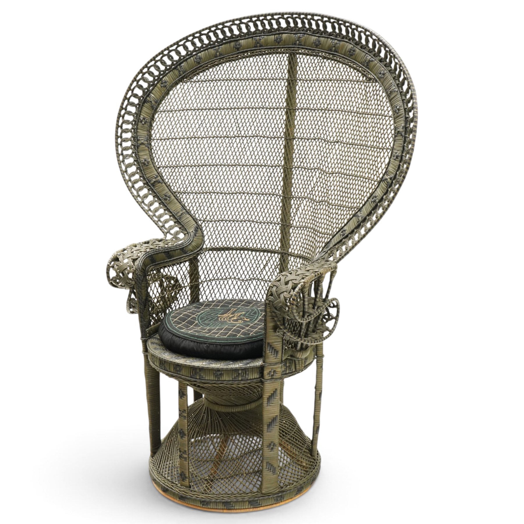 Mid-20th century wicker and rattan Peacock chair in unusual tones of dark olive and black, high fan back with a pieced and woven frame terminating to scrolled arms, with loose seat cushion