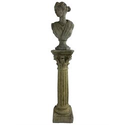 Classical design cast stone female bust depicting Artemis, raised on fluted Corinthian column with acanthus leaf capital, stepped square base, looking right 