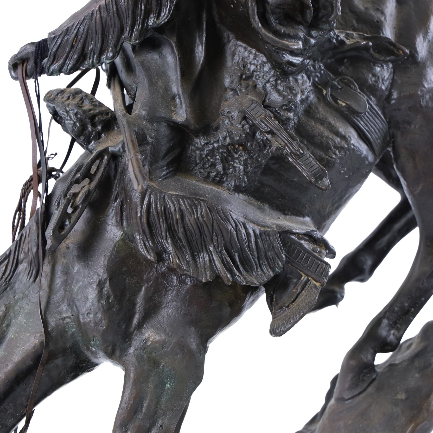 After Frederick Remington; The Mountain Man bronzed spelter figure of a native American trapper upon a marble base with plaque, H72cm