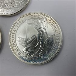 Five Queen Elizabeth II United Kingdom one ounce fine silver Britannia two pound coins dated 2002, 2003, 2004, 2005 and 2006
