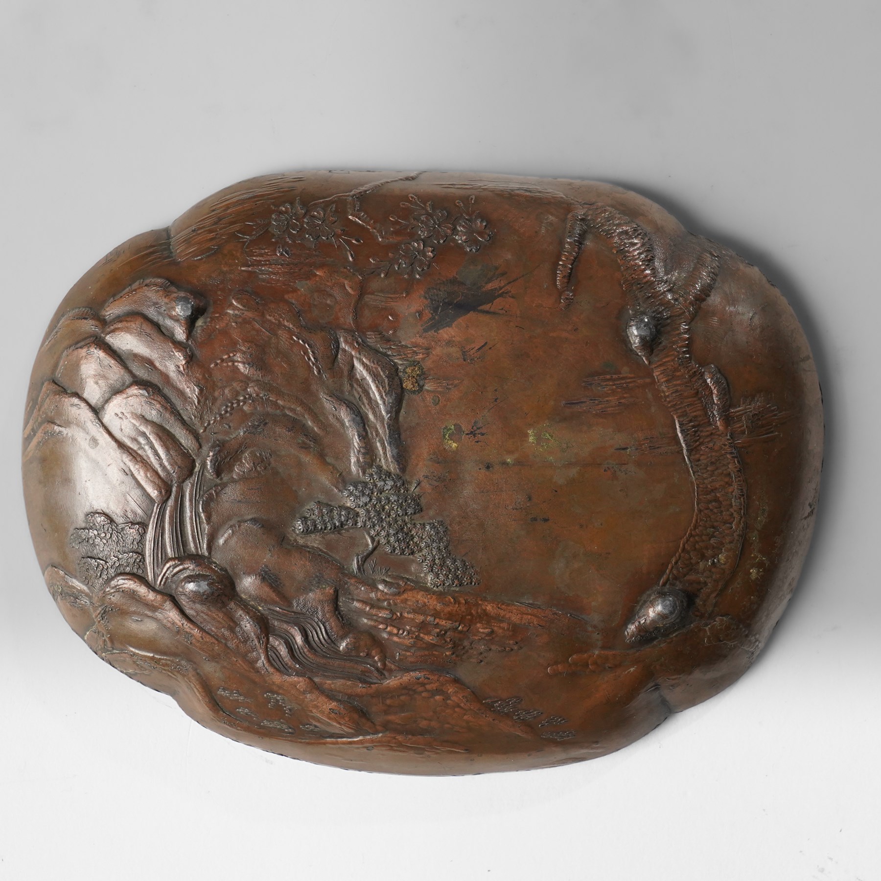 Japanese bronze tray, decorated in relief with two travellers in a landscape, W15cm 