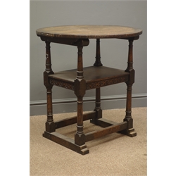  Early 20th century oak monks chair, guilloche carved tilting back, turned supports, square stretchers, sledge  feet, W70cm  