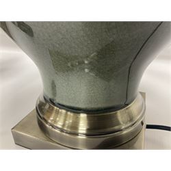 Pair of table lamps of squat baluster form, with a crackle glaze to a dark grey ground, upon a square base, including shade H57cm