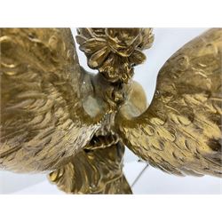 After Oswald Schimmelpfennig (German, 1872-1939): Pair of gilt bronze winged Allegorical female figures, the first example with arm outstretched holding a branch, signed 'Schimmelpfennig 1900', the second with arm raised above her head holding a book and sword in the other, both raised upon marble plinths, H45cm